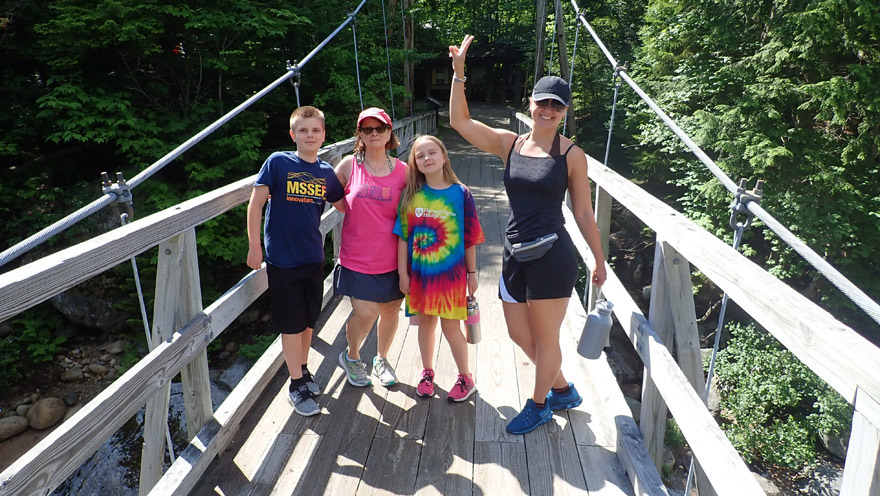 Family on the Lincoln Woods Trail bridge
